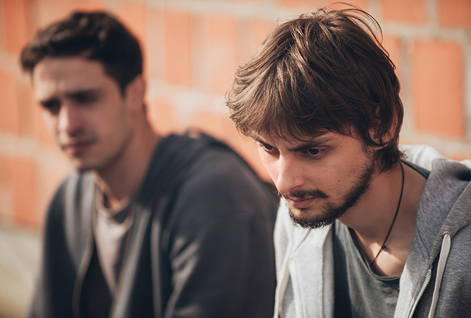 Two men sat together talking - mate suicidal
