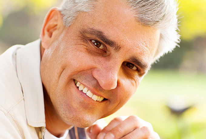 Health professional sitting in a field