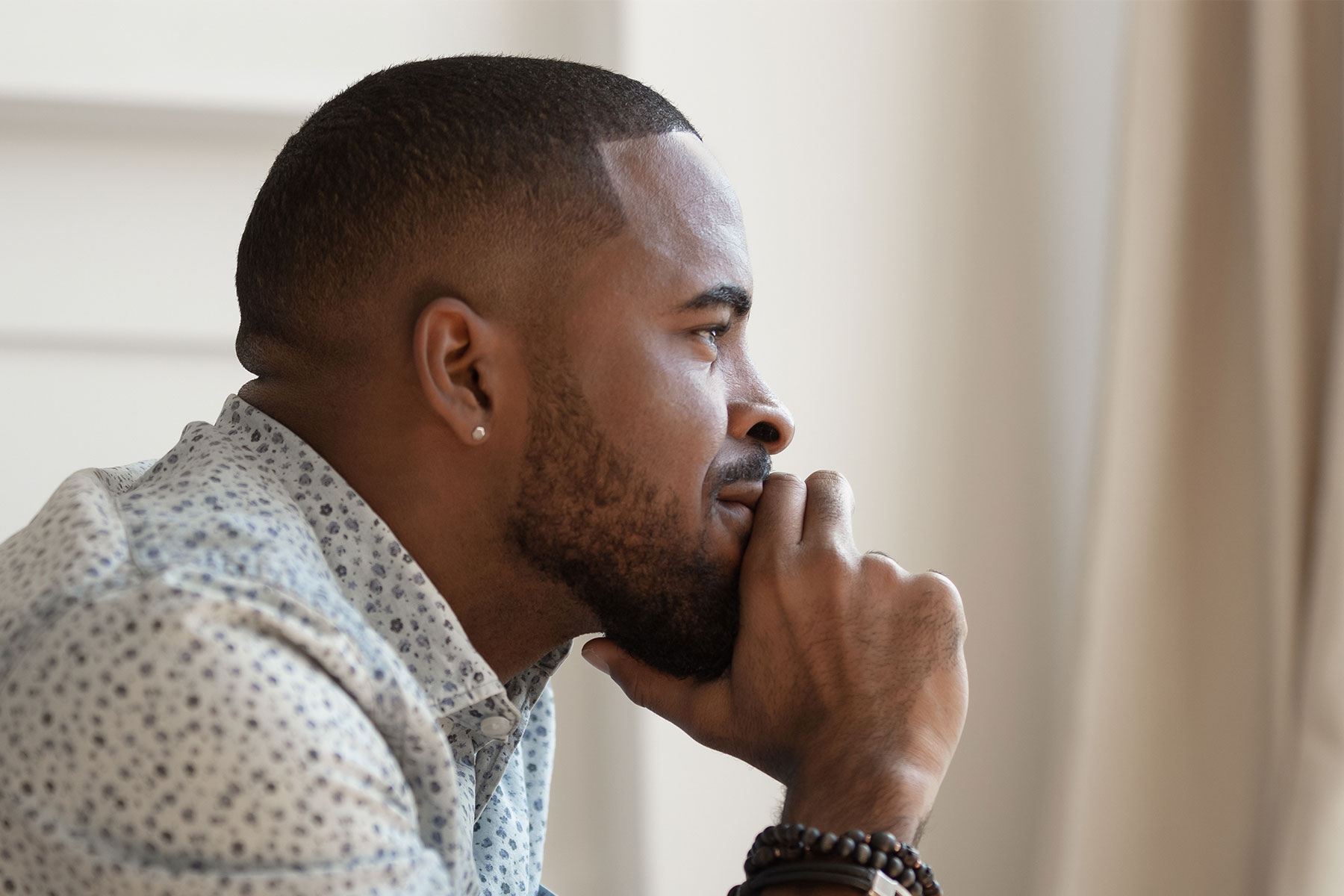 Man sat thinking 