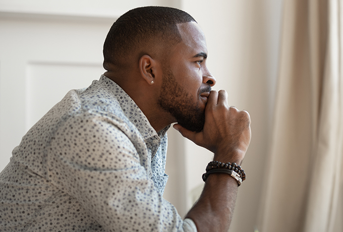 Man sat thinking