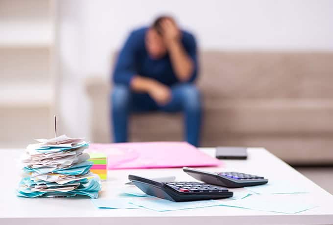 Man suffering financial anxiety and stress